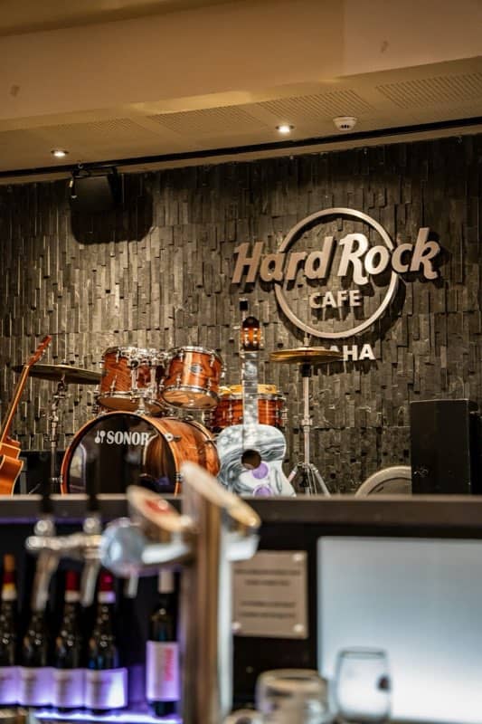 Drum kit set up behind a bar